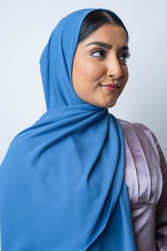 Our premium hijabs are beautifully crafted from incredibly soft and silky chiffon fabric. Measurements: 180 cm x 70 cm (70 in x 27 in) Elegant Blue Hijab For Eid, Solid Color Chiffon Hijab In Modest Style, Solid Chiffon Hijab Modest Style, Modest Solid Color Chiffon Hijab, Chiffon Hijab, Celestial Blue, Chiffon Fabric, Chiffon, Navy