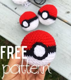 someone is holding up two crocheted pokeballs with the word free pattern