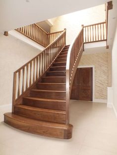 there is a wooden stair case in the house