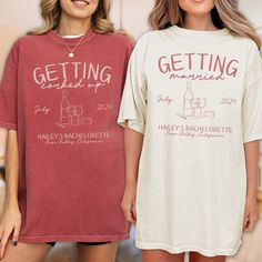 two women wearing matching t - shirts that say getting married