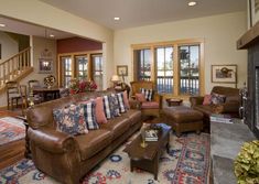 a living room filled with furniture and a fire place