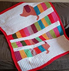 a crocheted afghan on a couch