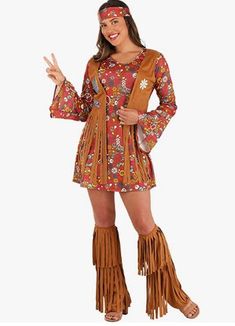 a woman in a hippie costume is posing for the camera with her peace sign