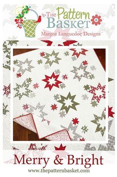 the pattern basket merry and bright quilt kit is shown in red, white and grey