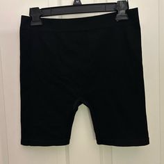 Never Worn!!! Color: Black Size: Large (Fits Like Medium) Ribbed Texture Pet Friendly Home Smoke Free Stretch Black Elastane Biker Shorts, Black Stretch Elastane Biker Shorts, Black Seamless Stretch Biker Shorts, Black Elastic Shorts With Short Legs, Black Elastic Shorts, Black Seamless Elastane Shorts, Elastic Seamless Biker Shorts, Seamless Elastic Biker Shorts, Black Stretch Above Knee Shorts