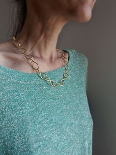 Made of brass. Hand textured. The chain is twisted for a special touch. Can be adjusted. Approximate length from end to end: 50 cm Elegant Brass Necklace With Chunky Chain, Elegant Oval Link Metal Chain Necklace, Chic Brass Necklace With Adjustable Chain, Chic Necklace With Adjustable Chain, Elegant Oval Link Chain Necklace, Brass Necklaces With Adjustable Oval Link Chain, Brass Oval Link Necklace With Adjustable Chain, Elegant Brass Link Chain Necklace, Chic Gold Brass Chain Necklace