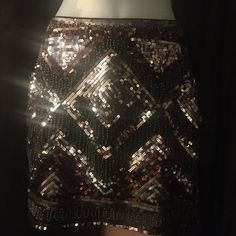 Description Short Skirt In Woven Fabric With Sequined (Black, Bronze And Silver) Embroidery And A Concealed Side Zip. Lined. Details 100% Polyester. Machine Wash Cold. Silver Embroidery, Hm Skirt, Short Skirt, Black Pattern, Side Zip, Woven Fabric, Black Gray, Black And Grey, Womens Skirt