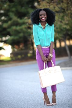 Nifesimi of Skinny Hipster wearing a bright turquoise blouse and purple gelato colored pants Lilac Pants Outfit, Amity Faction, Lilac Pants, Turquoise Pants, Taupe Bag, Outfits Black Women, Colour Clash