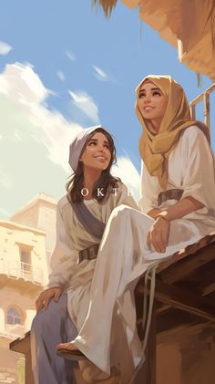 two women sitting on top of a roof next to each other, one wearing a headscarf