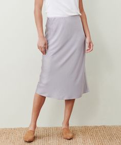 Slip Skirt Frost The easy silhouette of this everyday bias skirt makes it the perfect piece for dressed-up nights or days on-the-go. Pair your slip skirt with your favorite Jenni Kayne knit—from cashmere to cotton, we love the simplicity of cozy layers worn with seasonal hues. 100% polyester. Made in China of Japanese fabric. Bias Skirt, Easy Silhouette, Jenni Kayne, Slip Skirt, Fall Favorites, Japanese Fabric, Get Dressed, High Waisted Skirt, Midi Skirt