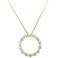 This sparkling 1.19ct tw Diamond Circle of Life pendant necklace radiates with the beauty of a perfect circle. Inspired by eternity and completeness, this timeless piece is perfect for any occasion and will ignite the room with its dazzling sparkle. Metal: 18K Yellow GoldDiamond Weight: 14 Round Brilliant Cuts 1.19ct tw Length: 18" - Circle D: 17mm Diamond Circle Pendant, White Gold Pendant Necklace, Perfect Circle, Circle Diamond, A Perfect Circle, Circle Of Life, Swirl Design, Rose Gold Necklace, Circle Pendant