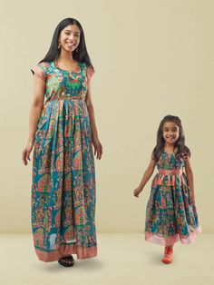 Blue Kalankari Print Mom and Daughter Matching Dresses | Muvvas Boutique | Mother Daughter Dress Matching Blue Floral Print Sets For Festivals, Blue Printed Motifs Sets For Festive Occasion, Sleeveless Multicolor Sets With Printed Motifs, Blue Bollywood Style Block Print Sets, Blue Bollywood Sets With Floral Print, Multicolor Sleeveless Sets With Printed Motifs, Blue Floral Print Festival Sets, Blue Bollywood Block Print Sets, Cotton Sleeveless Dress For Navratri