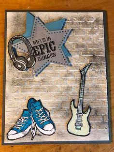 a card with some shoes and a guitar on it