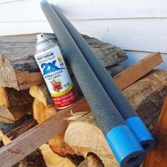 a close up of some wood with a guitar in it and a bottle of glue on top