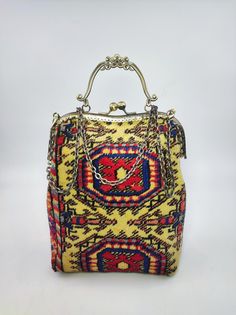 Welcome to AliDesignStore This Large Size Bag made of one of a kind Hand-sourced vintage Turkish Kilim Carpet Suede-like interior. Measurements ; Width 21 cm x Height 26 cm x Depth 10 cm Measurements: Width 8,3 İnch x Height 10,2 İnch x Depth 4 inch (All mesurements are Approximate ) - Handcrafted - Materials : Vintage Turkish Kilim Rug Brass Accessories Suede-like interior Ships from a small business in Turkey Interior Measurements, Brass Accessories, Carpet Bag, Vintage Turkish Kilim Rug, Vintage Carpet, Women Bag, Turkish Kilim Rugs, Bag Women, Large Bags