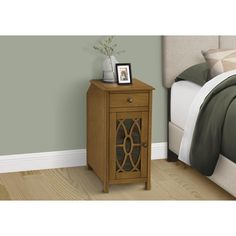 a night stand with an open door on the side