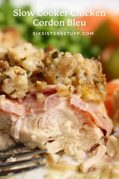 a close up of food on a plate with a fork