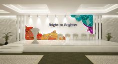 an empty room with white chairs and bright colored graphics on the wall above it that says bright to brighter