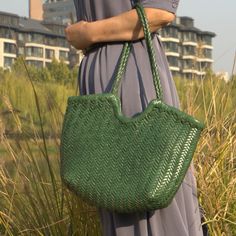 This woven leather handbag is spacious. 'Vittoria' tote that's perfect for everyday use. It features soft yet durable vegetable tan calf leather. Handmade by experienced artisan. Vegetable tanned calf leather - soft and durable.  Use delicate cream to clean and care for the leather. Eco-friendly Woven Leather Shoulder Bag For Shopping, Handheld Woven Leather Hobo Bag For Shopping, Casual Green Woven Leather Shoulder Bag, Handwoven Leather Bucket Bag With Double Handle, Intrecciato Weave Straw Shoulder Bag For Shopping, Handwoven Leather Double Handle Bucket Bag, Everyday Green Shoulder Bag With Intrecciato Weave, Green Intrecciato Weave Tote Shoulder Bag, Casual Handwoven Leather Bag