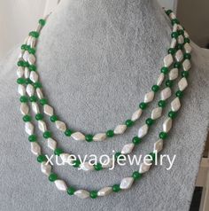 Welcome to my shop my dear friend. I hope you will like my jewelry, and most of my jewelry are made by myself. Please see the detail for this item: Pearl Jewelry: necklace length: can choose color: white & green Size:6mm jade beads, pearl size: around 8*12.5 mm if you need other length, contact me please! About shipping: I will send out your order in 3-5 business days from China. Generally takes 10-20 days to reach. Sometimes maybe a little earlier or later Please note that the United States sho Handmade White Jade Beaded Necklaces, Green And White Pearls Necklace, Elegant Green Jade Pearl Necklace, Multicolor Beaded Jade Necklaces, Traditional Hand-strung Jade Beaded Necklace, Jade Bead Necklace, Pearl Jewelry Design, Pearl Earrings Wedding, Baroque Pearl Necklace