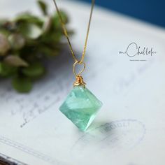 Raw Green Fluorite Crystal Pendant Necklace, Octahedron shaped Crystal Necklace, Gold Wire Wrapped Pendent Necklace Genuine Octahedron shaped crystals, choose from: Amethyst and Green Fluorite.  Dimension:  approx 10mm.   Chain length available:50cm 60cm and 70cm. Please have a look at our store for our expanding range of Jewellery.  -  Packaging: Each item is packaged in our branded packaging, so your order is ready to be gifted. If the gift item is going straight to the recipient, please make Raw Crystal Pendant, Steel Gifts, Simple Stud Earrings, Aquamarine Pendant, Pendent Necklace, Circle Earrings Studs, Rainbow Crystal, Opal Earrings Stud, Fluorite Crystal