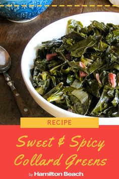 a white bowl filled with collard greens on top of a wooden table next to silverware