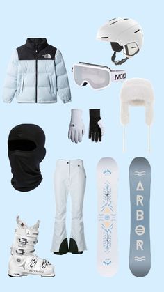 the snowboarder's gear is laid out neatly on a blue background, including gloves, goggles, and skis