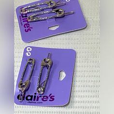 A Safety Pin Is A Symbol Of Solidarity. Show Off Yours With These Two-Pack Hair Barrettes. The Silver-Tone Beauties Have Glitter Details For Added Flair. Finish: Silver-Tone Length: 2 In. / 5.08 Cm. Closure: Barrette Material: Metal Pet/ Smoke Free Home. Ships Same Day. Safety Pin Hair, Safety Pin Hair Clip, Claire's Accessories, Pin Hair, Hair Barrettes, Safety Pin, Silver Glitter, Barrettes, Hair Pins