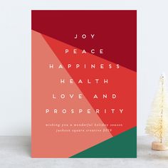 a christmas card with the words joy peace happiness health love and prosperity