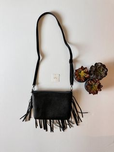 The Finley fringe purse features a removable shoulder strap to be able to wear as either a crossbody purse or carry as a large clutch! Zipper closure 1 main compartment, 1 zipper pocket, and 1 slip pocket 8”H x 10”L x 2”D Travel Fringe Clutch Bag, Travel Clutch Bag With Fringe, Everyday Clutch Bag With Tassels, Travel Fringe Crossbody Shoulder Bag, Fringe Crossbody Shoulder Bag For Travel, Fall Crossbody Shoulder Bag With Tassels, Travel Crossbody Shoulder Bag With Fringe, Crossbody Shoulder Bag With Fringe For Travel, Fall Tassel Crossbody Shoulder Bag