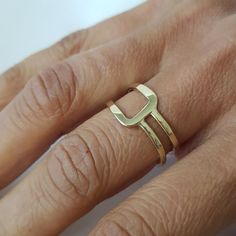 14K solid gold ring in a minimalist style for lovers of geometric shapes.◈ DETAILSWeight: 3gWidth upper part-9mm / 0.35''Thickness-1.3 mm / 0.05''◈ MATERIAL14K Solid Gold - Smooth,shiny,plain surface◈ ALSO AVAILABLE IN 14K/18K/9K Yellow, Rose, or White Gold◈ ENGRAVING is optional◈ SHIPPING is insured express and free worldwide◈ GIFT WRAPPING is included with every purchase✧ Back to my shop for more handcrafted gold jewelry:https://etsy.me/38Cs5ZlIf you have any questions, I will be happy to help Casual Gold Rings, Modern Rings In Recycled Gold, Tarnish Resistant, Geometric 14k Gold Jewelry, Minimalist Geometric 14k Gold Jewelry, Modern 14k Gold-filled Rings For Gifts, Bohemian Geometric Gold Jewelry, Gold Wrap Ring, Gold Rings Simple, Gold Anniversary