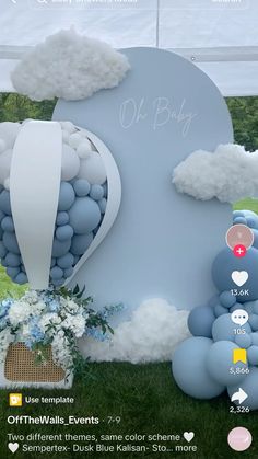 an image of a baby shower with balloons and clouds