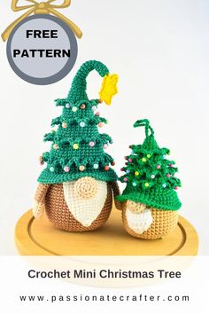 two crocheted christmas trees sitting on top of a wooden stand with the text free pattern