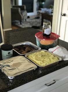 the meal is prepared and ready to be eaten on the kitchen counter in front of the computer