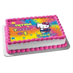 a hello kitty birthday cake with pink icing