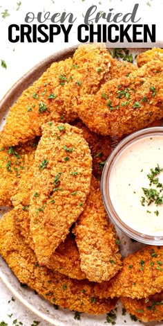 crispy chicken tenders with ranch dip on a plate