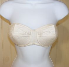 Fitted Underbust Bra Partially Lined, Beige Fitted Bra With Padded Cups, Fitted Beige Bra With Padded Cups, Fitted Cotton Bra With Medium Bust Support, Fitted Full Coverage Cream Bra, Fitted Partially Lined Strapless Bra, Fitted Strapless Bra Partially Lined, Fitted Cream Bra With Removable Pads, Fitted Beige Bra With Removable Pads