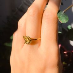 Embrace the beauty of nature with our 3D-printed Rose Ring. This intricately crafted piece captures the essence of a blooming rose, making it a stunning accessory for flower enthusiasts and nature lovers alike. Whether as a gift or a treat for yourself, this delicate and dainty ring is sure to make a lasting impression. Size: Varies by size about 2.5-3.5 tall and 1.2-1.3 thick