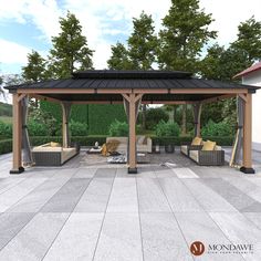 a gazebo sitting on top of a stone patio