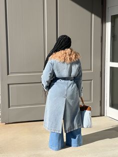 Introducing the Traci Denim Trench - a timeless and sophisticated addition to your wardrobe. This stunning trench coat boasts a gorgeous light wash denim, accented by a removable oversized Mongolian fur collar in a rich caramel hue. The removable waist belt cinches your figure, while the open style and side pockets provide comfort and convenience. Elevate your look this season with the ultimate fusion of classic and retro styles. SHIPS IN 14 BUSINESS DAYS. Composition: Cotton denim, Mongolian fu Chic Medium Wash Winter Outerwear, Chic Light Wash Fall Outerwear, Chic Light Wash Outerwear For Fall, Denim Accessories Jewelry, Faux Fur Cardigan, Mongolian Fur, Duster Dress, Fur Cardigan, Retro Styles