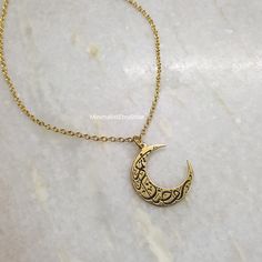 18K Gold Calligraphic Written on Moon Islamic Necklace, Engraving Moon Necklace, Arabic Necklace, Moon Necklace Gold, Minimal Moon Jewelry Details:- Length: 17 inches + Extender  Material: 18k gold plated, Brass Care:- When not wearing, please keep in a sealed plastic bag Packaging: All our pieces comes in a gift box bag so your item is ready to be gifted If you have any question feel free to contact us via Etsy message Happy Shopping Gold Moon-shaped Engraved Necklace, Half Moon Brass Necklace For Gift, Moon Shaped Necklace With Moon Print For Gift, Engraved Moon-shaped Brass Necklace, Engraved Moon Shaped Brass Necklace, Engraved Brass Moon Necklace, Moon Print Necklace Perfect For Gifts, Moon Print Moon Shaped Necklace For Gift, Moon Print Moon-shaped Necklace Gift