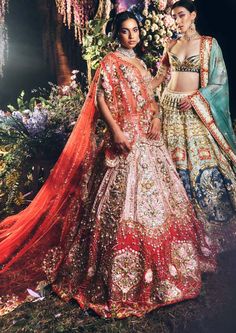 Editor's Note Featuring a 3 piece bridal lehenga set in pink & red raw silk embroidered with gold metal embellishments, pearls, glass cut beads, and precious stones. It is paired with a... Traditional Dresses Indian, Lilac Lehenga, Scalloped Dupatta, Indian Fits, Pink Bridal Lehenga, Papa Don't Preach, Lehenga Red, Indian Bridal Photos, Metal Embellishments