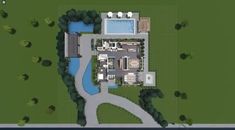 an aerial view of a large house with a swimming pool in the middle of it