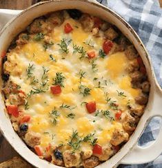 Dutch Oven Breakfast Casserole with Biscuits: Easy Dutch Oven Casserole! – Petite Panini Cast Iron Recipes Dutch Oven, Oven Breakfast Casserole, Dutch Oven Soups, Casserole With Biscuits, Dutch Oven Soup, Oven Breakfast, Dutch Oven Recipes Cast Iron, Eggs In Oven