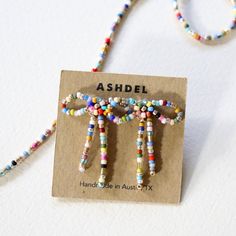 the necklace is made with colorful beads