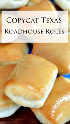 some food that is sitting on top of a blue and white plate with the words copycat texas roadhouse rolls