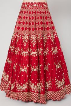 Red lehenga with floral embroidered motifs and crochet detail. Paired with embroidered cutwork blouse and dupatta.
Components: 3
Fabric: Raw Silk, Organza
Neckline: Boat
Sleeve Length: Short
Color: Red
Embroidered
Cutwork detail
Floral motif work
Crochet border - Aza Fashions Traditional Sets With Floral Embroidery For Reception, Floor-length Art Silk With Floral Embroidery, Festive Floor-length Floral Embroidered Fabric, Festive Red Sets With Motifs, Unstitched Red Embroidered Choli, Red Unstitched Embroidered Choli, Unstitched Red Choli With Intricate Embroidery, Anarkali Red Sets With Floral Embroidery, Red Saree Set With Floral Embroidery