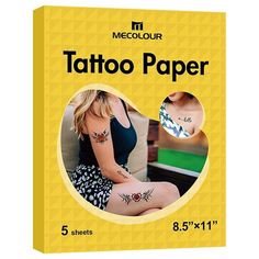 the tattoo paper is yellow and has an image of a woman's legs on it