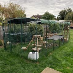 an outdoor play area in the middle of a yard