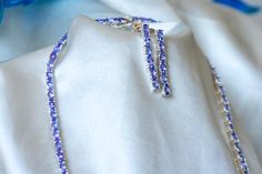 This beautiful, handmade jewelry set consists of a tennis necklace with natural, purple-blue sparkling tanzanite gemstones and a pair of gorgeous hanging tanzanite earrings. The necklace and the tennis earrings are made of 925 silver. The jewelry pieces impress with their elegant and high-quality design and are therefore an absolute highlight. The tanzanite is a very special gemstone. A tanzanite is 1000 times rarer than a diamond 💜 The tanzanite is a stone of the month of December.💜It stands Tennis Earrings, Handmade Jewelry Set, Poverty And Hunger, Tanzanite Necklace, Tanzanite Earrings, Tanzanite Gemstone, Tennis Necklace, Jewellery Set, Ear Studs